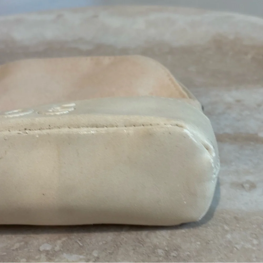 Chloe rounded linen and pleather cosmetic bag